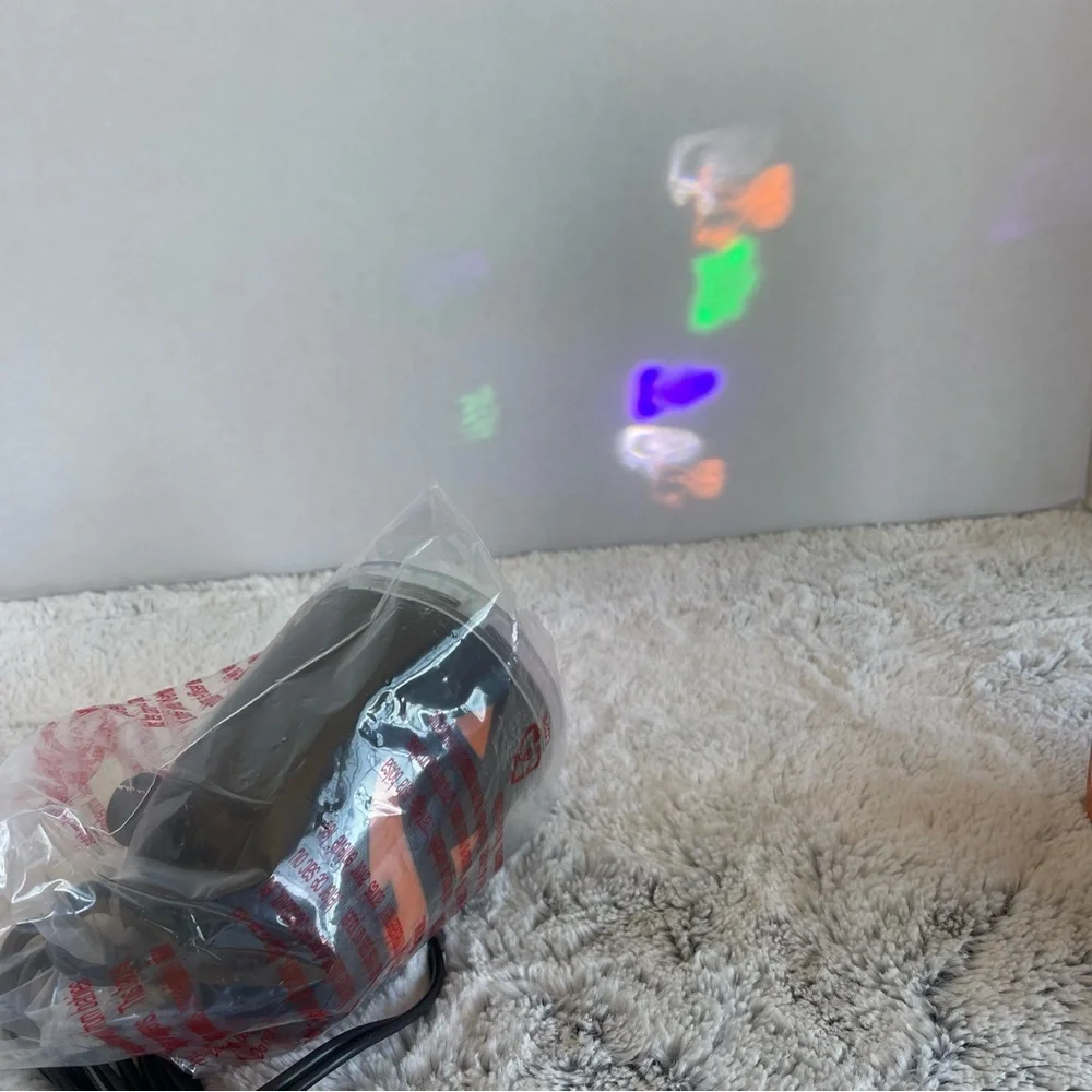 Disney Hocus Pocus LED Whirl-A-Motion Projection - Orange, Purple, Black, Green